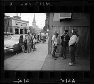 Teens hang out on Centre Street in Jamaica Plain in summertime, Boston