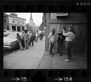 Teens hang out on Centre Street in Jamaica Plain in summertime, Boston