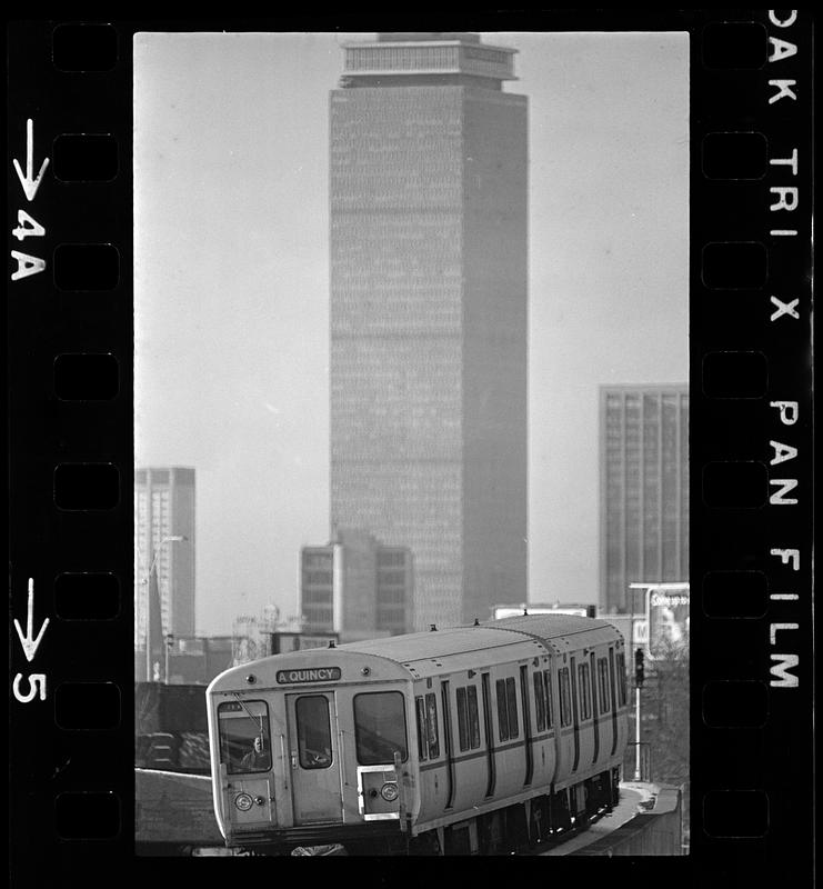 Red Line T train and Prudential Tower from Dorchester