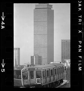 Red Line T train and Prudential Tower from Dorchester