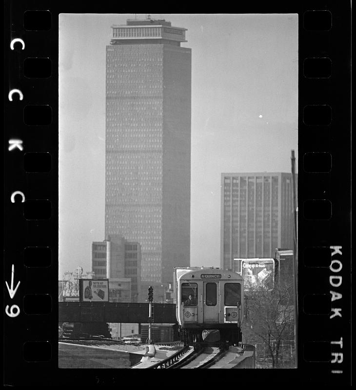 Red Line T train and Prudential Tower from Dorchester