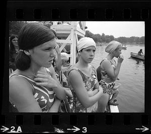 Swimmers watch waterskiers, Newton