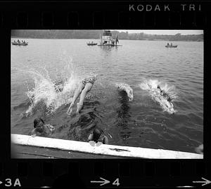 Kids dive into Dorchester Bay on summer afternoon, Dorchester