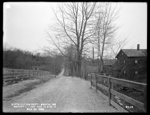 Distribution Department, Southern High Service Pipe Line, Section 19, station 11, Reservoir Lane; Webber's Waste Weir (Cochituate Aqueduct), in middle ground, right, Brookline, Mass., Nov. 26, 1898