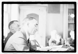 Group of men at table