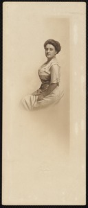 Unidentified woman seated and wearing beaded fringe sleeves