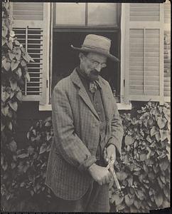 A man carving wood