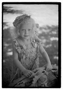 Girl holding decorated hoop