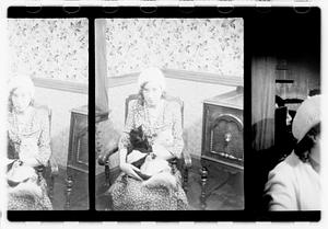 Unidentified woman holding cats