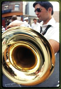 Boston - N. End 1981 - A member of a band pauses during the procession of St. Anthony's statue during St. Anthony's Feast