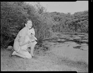 Gertrude Lawrence at East Dennis home with dog