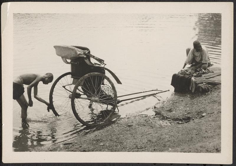 Rickshaws in a flooded [hutang?]