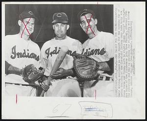 New Talent for the Tribe--Comparing their working equipment as they report the opening day of Spring training at the Cleveland Indians camp here today are these three new faces. Left to right: Glenn "Rocky" Nelson, who has hopes of first-base job; Dave Philley, obtained from the Athletics and who is shooting for rightfield; and Mickey Grasso, catcher obtained from Montreal.