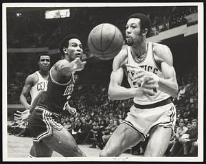 Eyeing the Ball are Dave Bing (left) of Pistons and Rich Johnson of Celtics as Jo Jo White moves in on play during game at Boston Garden