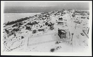 Snowy landscape with houses