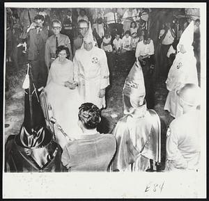 Klan Wedding in Farmville, N.C., united James Earl Taylor and Bessie Irene Tysen. About 5,000 attended the Saturday night ceremony, the first public Ku Klux Klan wedding in North Carolina since 1926.