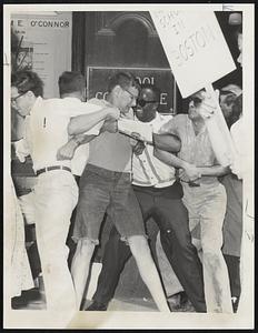 Pickets lock arms at School Committee Building.