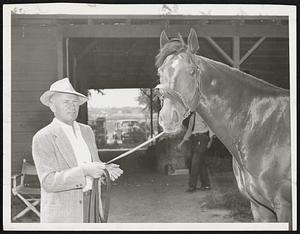 Sande's Star at Suffolk for the Massachusetts Handicap Saturday is Stagekid. Trainer Earle Sande, shown with his protege, went from jockey to trainer to his current position as owner-trainer of his own stable of 11 at Belmont Park.