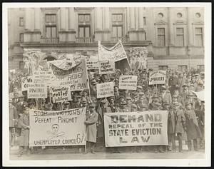 Jobless March On Pennsylvania's Capital. Members of the "Unemployed Army" which came from all points of Pennsylvania to present demands for $100,000,000 unemployment relief to the Pennsylvania State Legislature and governor Gifford Pinchot, photographed in front of the State Capitol on March 1.