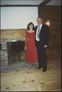 Jeanne and Dick Palmer in their restored living room, dressed for Celebration Ball