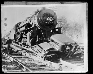 Locomotive 3146 hits an automobile on the tracks