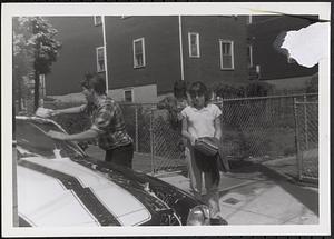 Man washing a car