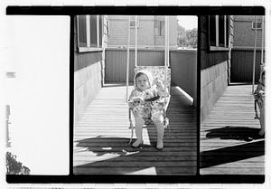 Child in a swing seat