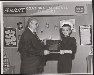 "Miss Boatlife 1966" displays new product