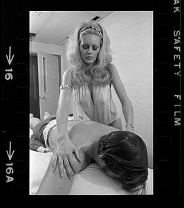Masseuse at work, Combat Zone