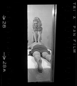 Masseuse at work, Combat Zone