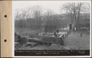 General view from loading end of sluicing test bin, Enfield, Mass., Nov. 24, 1933