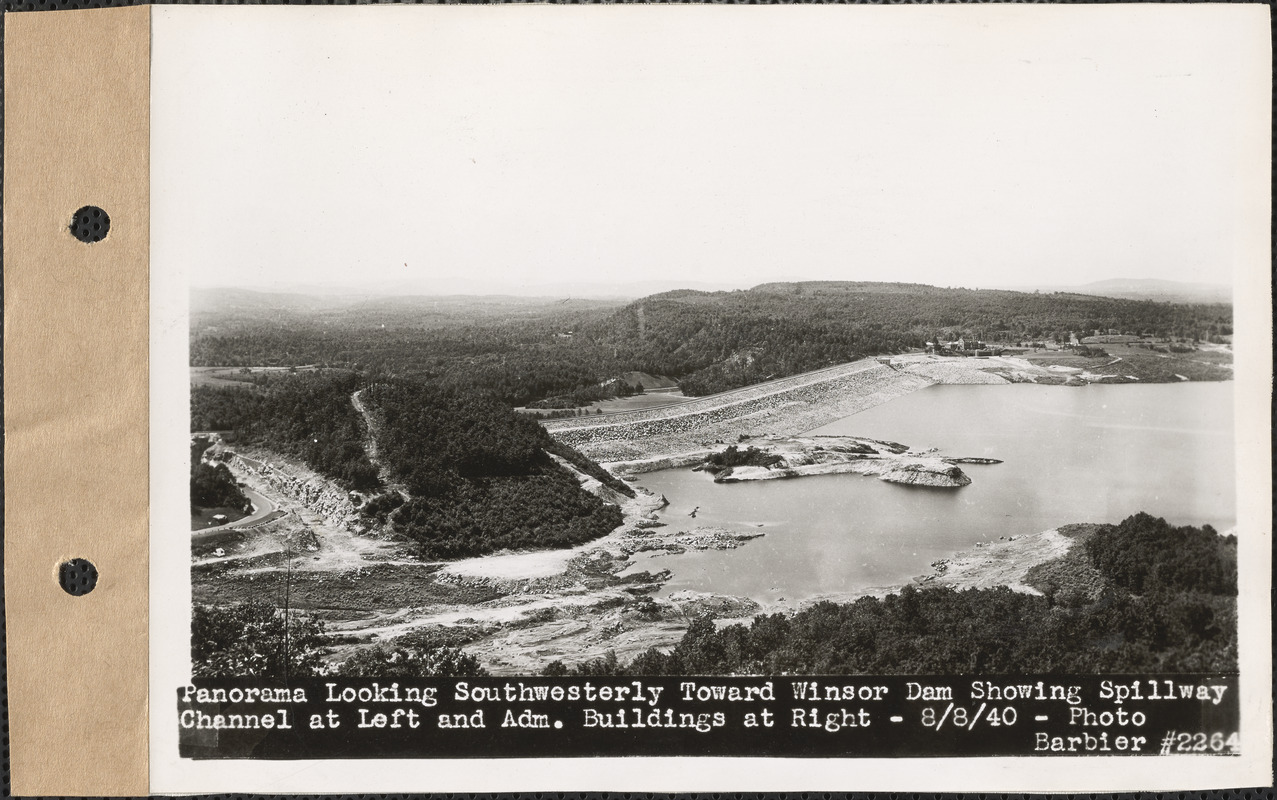 Panorama looking southwesterly toward Winsor Dam showing spillway channel at left and administration buildings at right, Quabbin Reservoir, Mass., Aug. 8, 1940
