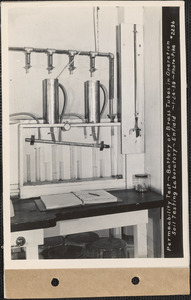 Permeability test, battery of brass tubes in operation, soil testing laboratory, Enfield, Mass., Jan. 24, 1939