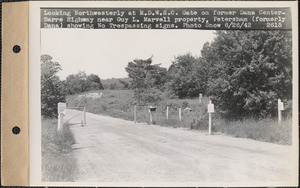 Looking northwesterly at MDWSC gate on former Dana Center-Barre Highway near Guy L. Marvell property, showing "No Trespassing" signs, Petersham (formerly Dana), Mass., June 26, 1942