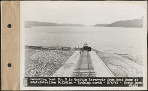 Launching boat #3 in Quabbin Reservoir from boat ramp at Administration Building, looking north, Quabbin Reservoir, Mass., May 4, 1943