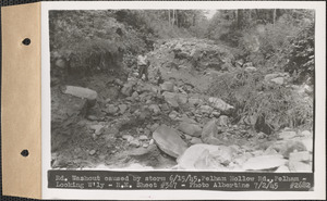 Road washout caused by storm June 15, 1945, Pelham Hollow Road, looking westerly, Pelham, Mass., July 2, 1945