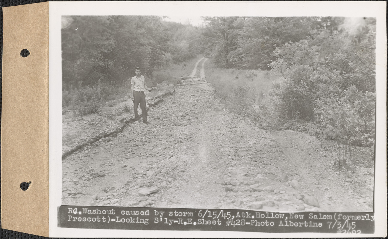 Road washout caused by storm June 15, 1945, Atkinson Hollow, looking southerly, New Salem (formerly Prescott), Mass., July 3, 1945