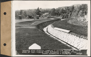 General view showing grading and cobble gutter on north side of East Access Road entrance, looking westerly, Ware, Mass., Nov. 26, 1945