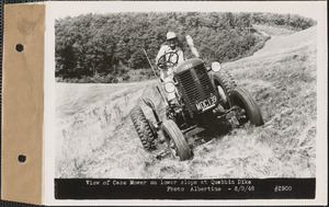 View of Case mower on lower slope at Quabbin Dike, Quabbin Reservoir, Mass., Aug. 9, 1948