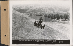View of Case mower on middle slope at Quabbin Dike, Quabbin Reservoir, Mass., Aug. 9, 1948