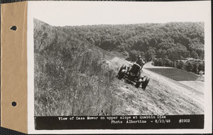 View of Case mower on upper slope at Quabbin Dike, Quabbin Reservoir, Mass., Aug. 10, 1948