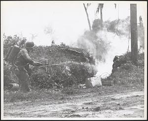 Marine flamethrower in action near the old Orote Golf Course, Guam