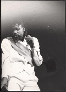 Musician performing with a microphone