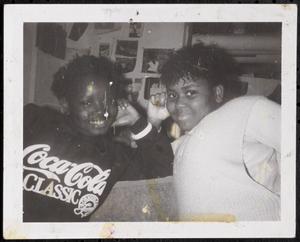 Two young people posing