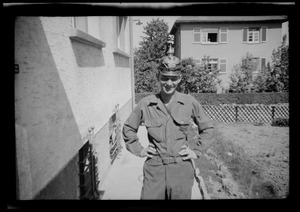 Warren Favor, of the U. S. Army's 649th Engineer Battalion, wearing German military helmet, Waiblingen, Germany