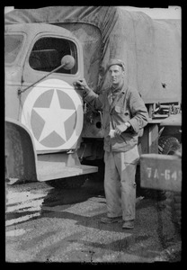 U. S. Army soldier with military truck, Faverney, France