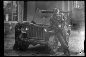 U. S. Army soldiers repairing a jeep, Fontainebleau, France