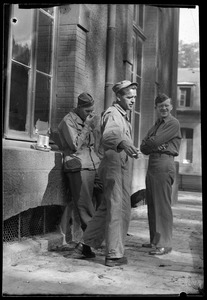 Frank Magdalinski, left, and Leland Waite, center, of the U. S. Army's 649th Engineer Battalion, with unidentified soldier, Fontainebleau, France