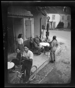 U. S. Army soldiers at café in France