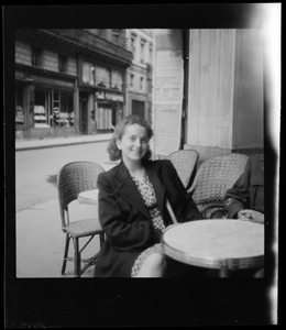 Woman in café, France